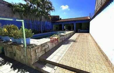 Imagem: A casa possui 3 Dormitórios, 3 Banheiros, 3 Vagas na garagem