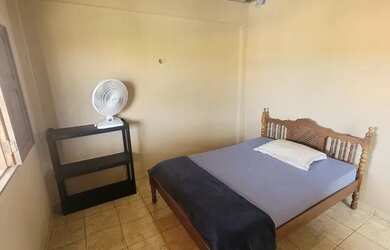 Imagem: A casa possui 4 Dormitórios e 2 Vagas na garagem e está localizado