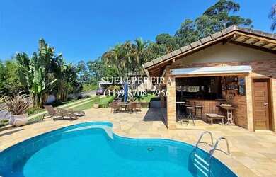 Imagem 3: Casa de condomínio para venda possui 322 metros quadrados com 5 quartos...