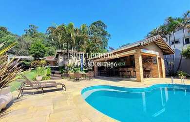 Imagem 2: Casa de condomínio para venda possui 322 metros quadrados com 5 quartos...