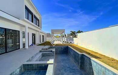 Imagem: A casa em condomínio possui 5 Dormitórios, 5 Banheiros, 4