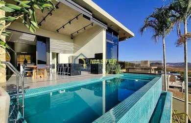 Imagem: A casa possui 5 Dormitórios, 5 Banheiros, 5 Vagas na garagem