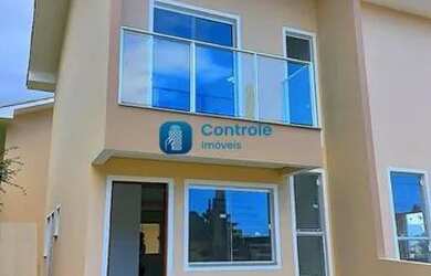 Imagem: A casa possui 2 Dormitórios, 2 Banheiros, 2 Vagas na garagem