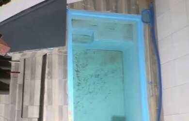 Imagem: A casa possui 3 Dormitórios, 4 Banheiros, 3 Vagas na garagem