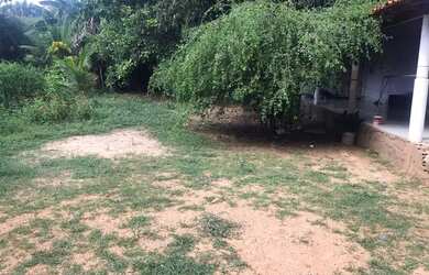 Imagem: A casa possui 3 Dormitórios, 1 Banheiro, 2 Vagas na garagem