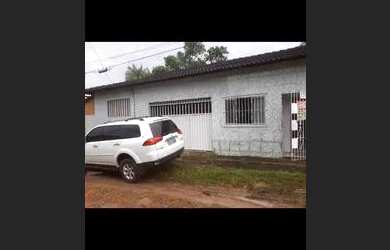 Imagem: A casa possui 3 Dormitórios, 2 Vagas na garagem e está localizado