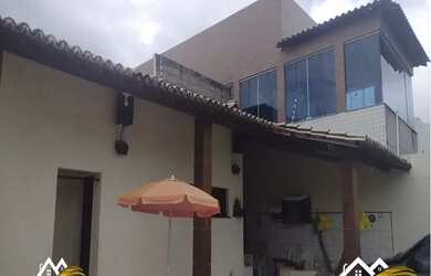 Imagem: A casa possui 4 Dormitórios, 4 Banheiros, 5 Vagas na garagem