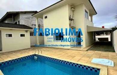 Imagem: A casa possui 3 Dormitórios, 5 Banheiros, 4 Vagas na garagem