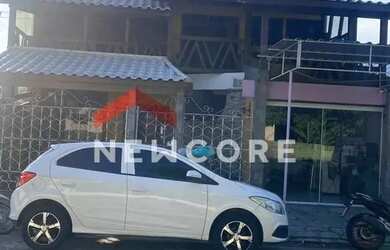 Imagem: A casa possui 4 Dormitórios, 4 Banheiros, 2 Vagas na garagem