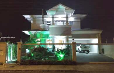 Imagem: A casa possui 3 Dormitórios, 4 Banheiros, 3 Vagas na garagem