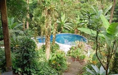 Imagem: A casa possui 5 Dormitórios, 3 Banheiros, 5 Vagas na garagem