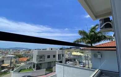 Imagem: A casa possui 2 Dormitórios, 3 Banheiros, 2 Vagas na garagem