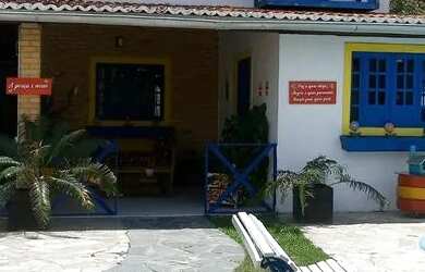 Imagem: A casa possui 3 Dormitórios, 3 Vagas na garagem e está localizado