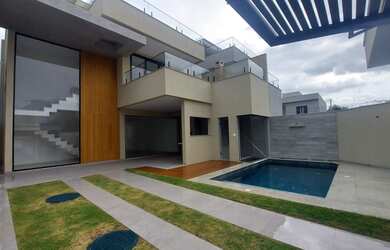 Imagem: A casa em condomínio possui 4 Dormitórios, 5 Banheiros, 4