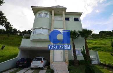 Imagem: A casa em condomínio possui 5 Dormitórios, 5 Banheiros, 5