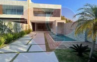 Imagem: A casa em condomínio possui 5 Dormitórios, 5 Banheiros, 3