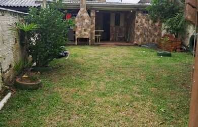 Imagem: A casa possui 3 Dormitórios, 1 Banheiro, 3 Vagas na garagem