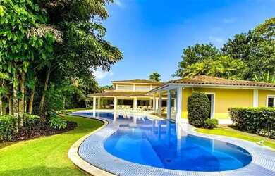 Imagem: A casa em condomínio possui 5 Dormitórios, 5 Banheiros, 4