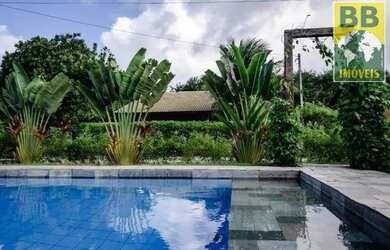 Imagem: A casa possui 3 Dormitórios, 3 Banheiros, 2 Vagas na garagem