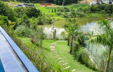 Imagem: A casa em condomínio possui 5 Dormitórios, 5 Banheiros, 5