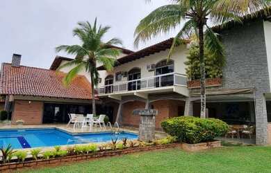 Imagem: A casa em condomínio possui 4 Dormitórios, 5 Banheiros, 5