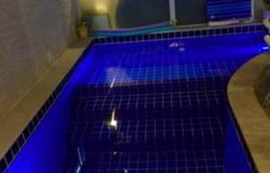 Imagem: A casa em condomínio à venda possui 4 Dormitórios, 5 Banheiros