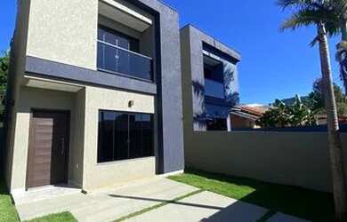 Imagem: A casa à venda possui 2 Dormitórios, 3 Banheiros, 1 Vaga na