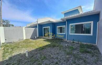 Imagem: A casa possui 3 Dormitórios, 2 Banheiros, 1 Vaga na garagem