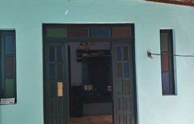 Imagem: A casa possui 2 Dormitórios, 1 Banheiro, 1 Vaga na garagem