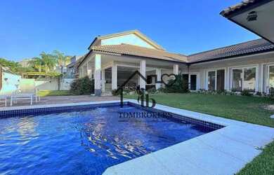 Imagem: A casa em condomínio possui 5 Dormitórios, 5 Banheiros, 5