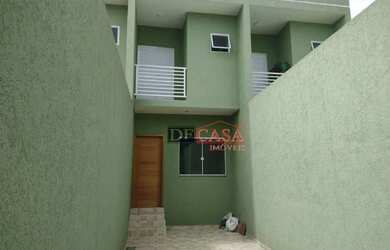 Imagem: A casa possui 3 Dormitórios, 2 Banheiros, 2 Vagas na garagem