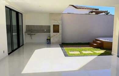 Imagem: A casa possui 3 Dormitórios, 5 Banheiros, 3 Vagas na garagem