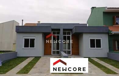 Imagem: A casa possui 2 Dormitórios, 2 Banheiros, 1 Vaga na garagem