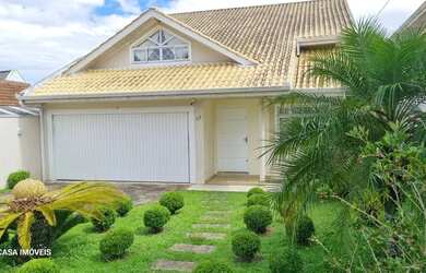 Imagem: A casa possui 3 Dormitórios, 3 Banheiros, 5 Vagas na garagem