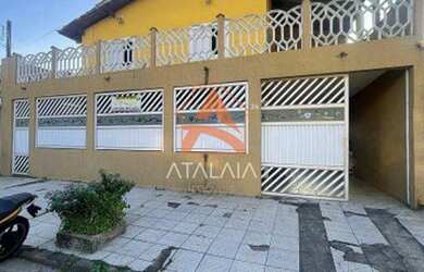 Imagem: A casa possui 4 Dormitórios, 2 Banheiros, 3 Vagas na garagem