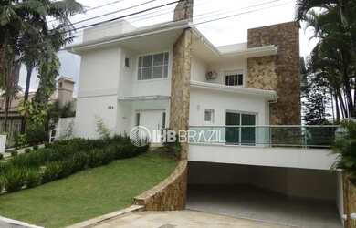 Imagem: A casa possui 4 Dormitórios, 5 Banheiros, 5 Vagas na garagem