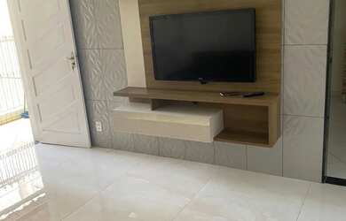 Imagem: A casa possui 2 Dormitórios, 2 Banheiros, 1 Vaga na garagem