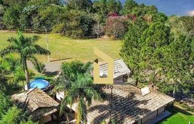 Imagem: A casa em condomínio possui 4 Dormitórios, 4 Banheiros, 5