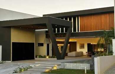 Imagem: A casa possui 4 Dormitórios, 5 Banheiros, 237m² de Área e