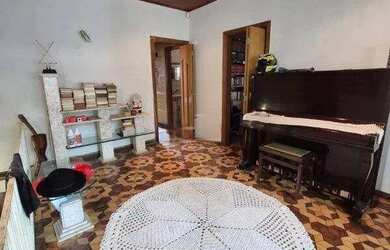 Imagem: A casa possui 3 Dormitórios, 3 Banheiros, 3 Vagas na garagem