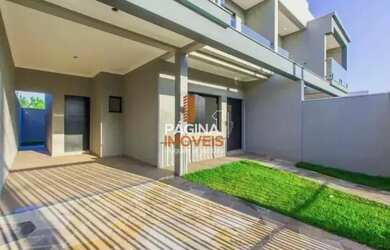 Imagem: A casa possui 3 Dormitórios, 3 Banheiros, 2 Vagas na garagem