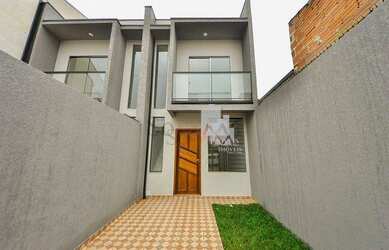 Imagem: A casa possui 3 Dormitórios, 2 Banheiros, 2 Vagas na garagem