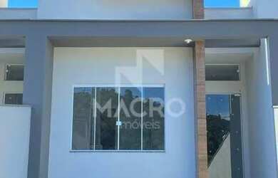 Imagem: A casa possui 2 Dormitórios, 2 Banheiros, 1 Vaga na garagem