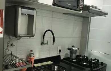 Imagem: O apartamento possui 2 Dormitórios, 1 Banheiro, 1 Vaga na garagem