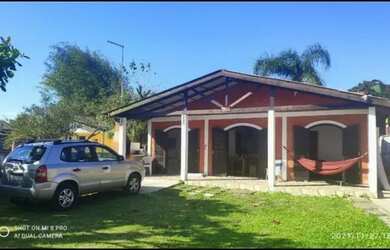 Imagem: A casa possui 3 Dormitórios, 3 Vagas na garagem, Churrasqueira