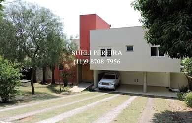 Imagem: A casa em condomínio possui 4 Dormitórios, 5 Banheiros, 5