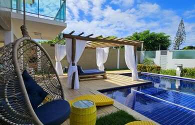 Imagem: A casa possui 5 Dormitórios, 2 Vagas na garagem e está localizado