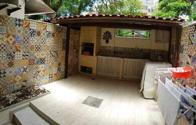 Imagem: A casa em condomínio possui 3 Dormitórios, 4 Banheiros, 2