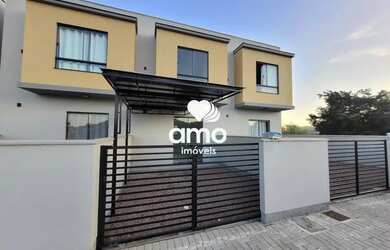 Imagem: A casa possui 2 Dormitórios, 2 Banheiros, 1 Vaga na garagem