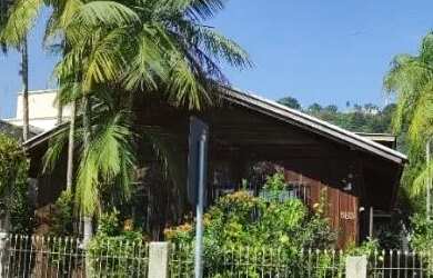 Imagem: A casa possui 4 Dormitórios, 2 Banheiros, 155m² de Área e